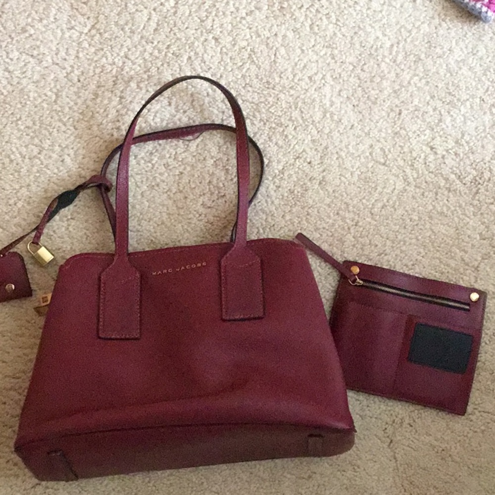 Marc Jacob’s purse. Burgundy in color.